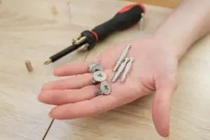 Using materials to fix a wobbly table